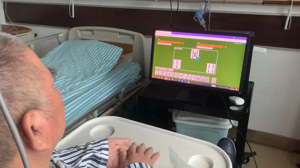 A brain-controlled mahjong game with artificial intelligence augmentation